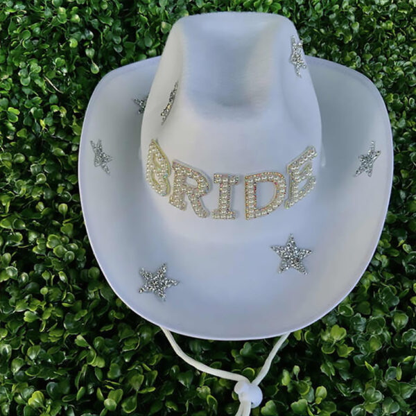 Brides and Baches Bride Bling Hat on grass.