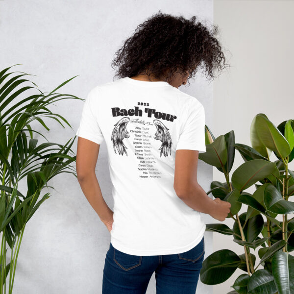 Girl wearing and showing back of white Bach Concert Tour T-shirt for Brides and Baches Bachelorette Party