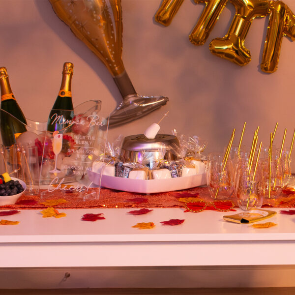 Mountains and Mimosas Bachelorette Party Theme Smores Bar, Mimosa Bar and Tumblers with gold.